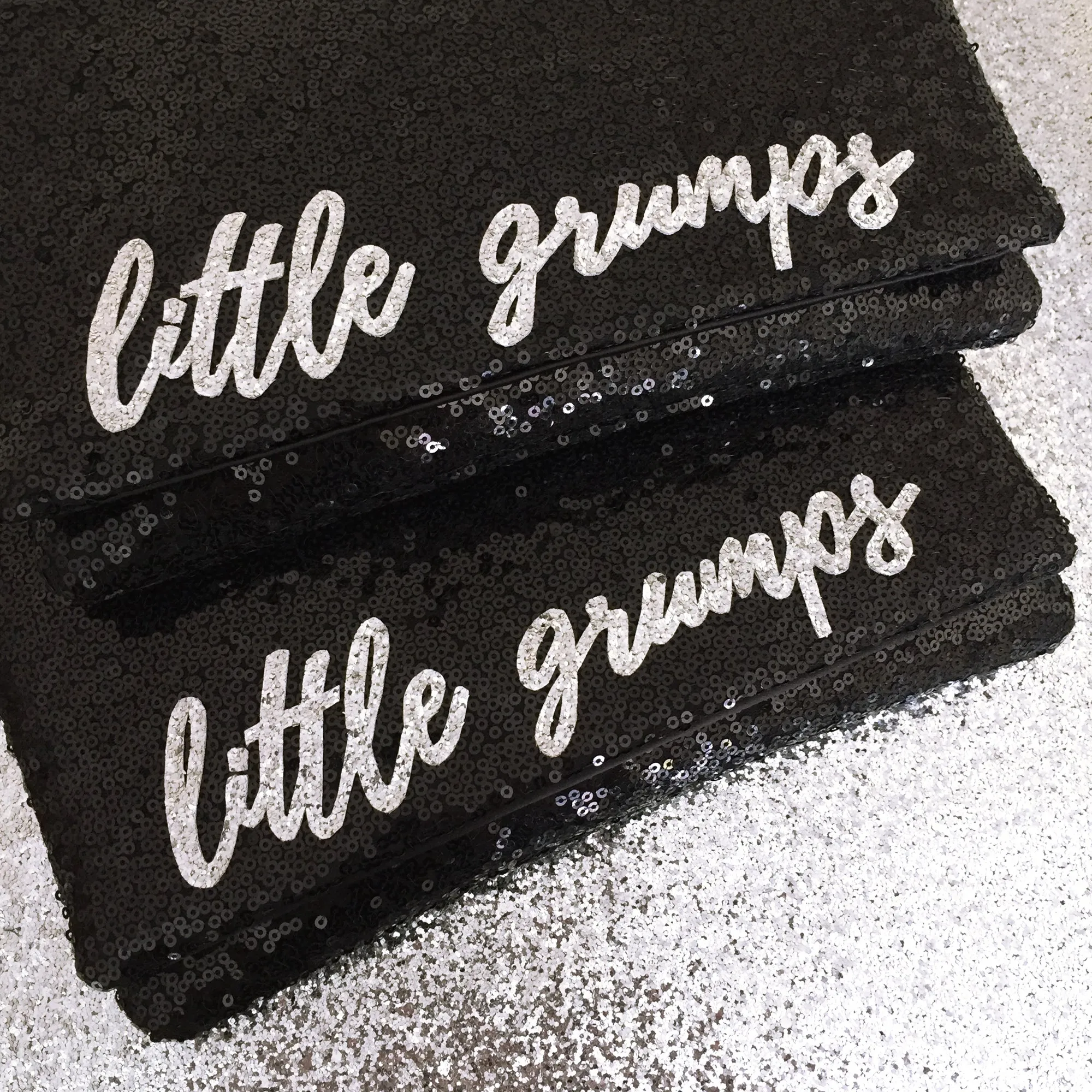 Black or navy SLOGAN sequin clutch handbag