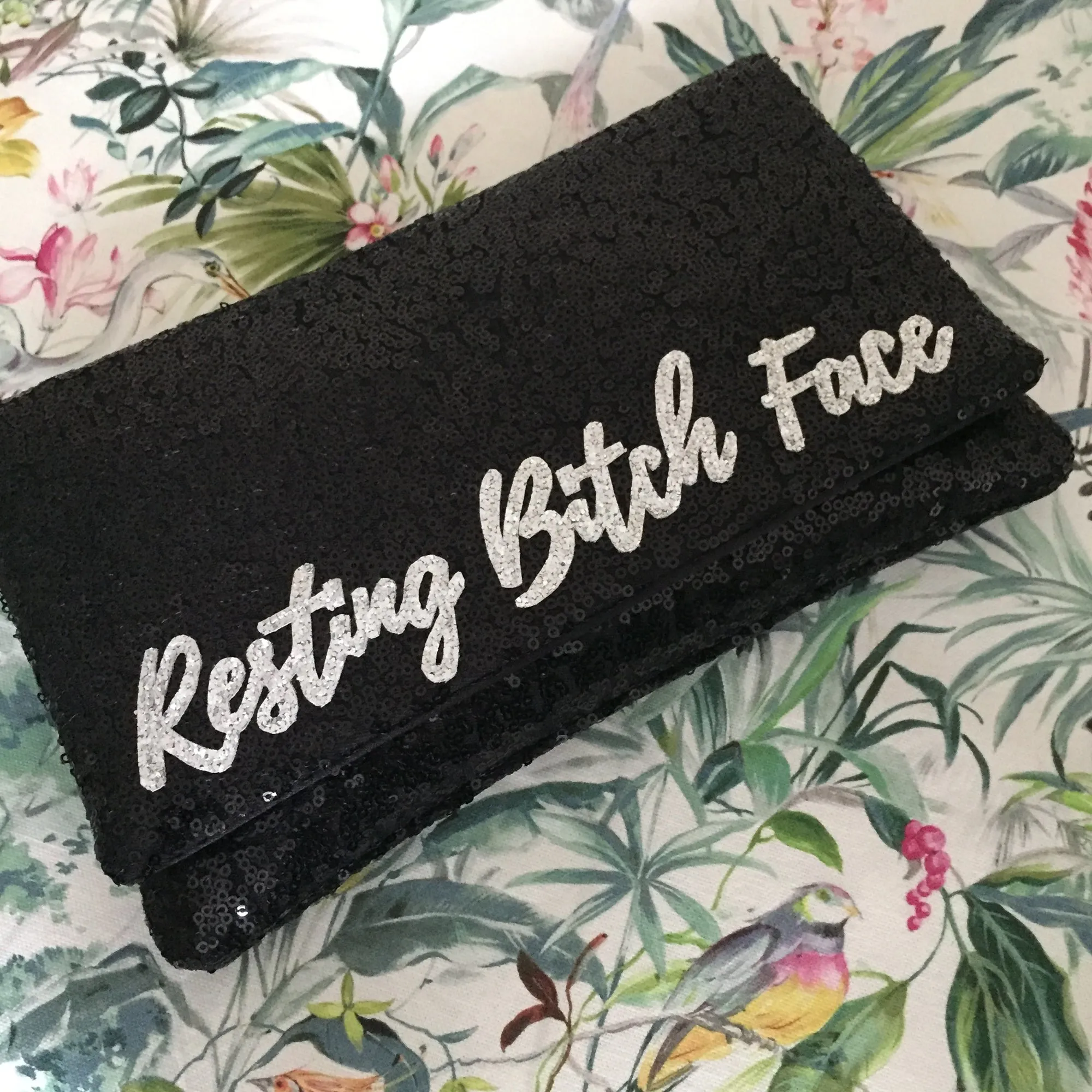 Black or navy SLOGAN sequin clutch handbag