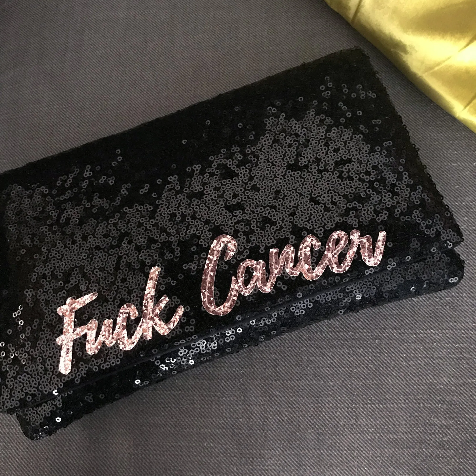 Black or navy SLOGAN sequin clutch handbag